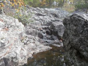 Rocks and pools near the top of Mina Sauk Falls.